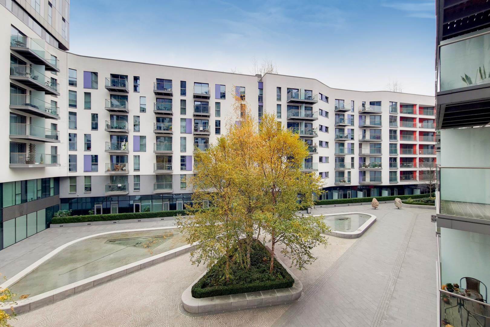 External view of a block of apartments with courtyard area